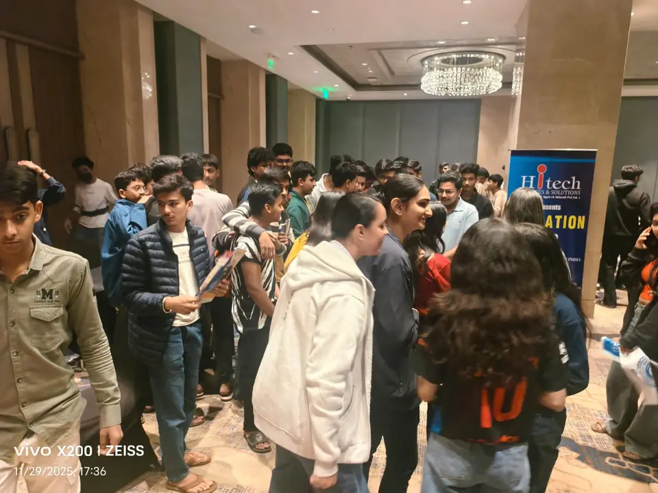 Students meeting university representatives at an education fair